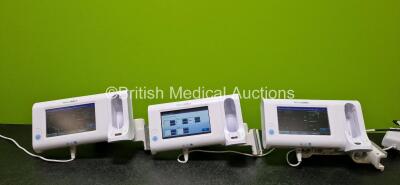 3 x Welch Allyn Connex Spot Vital Signs Touchscreen Monitors (All Power Up and 1 x Faulty Touchscreen) with 3 x Power Supplies and 3 x GCX Mounting Arms *SN 100094613819 / 100094563819 / 100015911519*