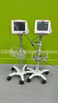 2 x Philips IntelliVue MP30 Patient Monitors on Stands (Both Power Up) with 2 x Philips M3001A Module with ECG, SpO2, NBP, Press and Temp Options *SN DE52613085 / DE801C4865*