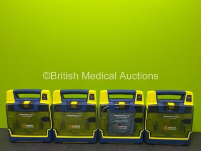 4 x Cardiac Science Powerheart AED G3 Defibrillators with 4 x LiSO2 Batteries (All Power Up, 1 x Flat Battery)