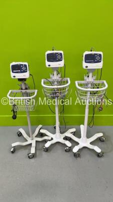 3 x Welch Allyn ProPaq LT Patient Monitors with Docking Stations, Power Supplies and Various Leads on Stands (All Power Up) *S/N KA010359 / KA009098 / KA008365*