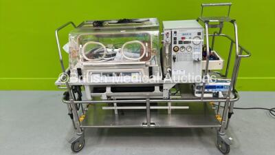 Drager Isolette TI500 Infant Transport Incubator on CCT Trolley with Reanimator F120 and CareFusion CC Alaris Plus Syringe Pump *S/N XT05560* **G**