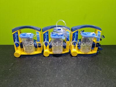 3 x Laerdal LSU Suction Units (All Power Up,All Units with Damage, 1 x Loose Casing) with 3 x Suction Cups, Hoses and 3 x Batteries