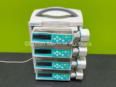 4 x B.Braun Perfusor Space Syringe Pumps with 1 x B.Braun Space Station and 1 x Power Supply (All Power Up, 1 x Damage to Casing - See Photos)