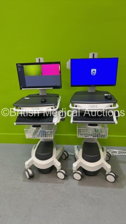 2 x Spire Healthcare Mobile Workstations with Monitors (Both Power Up) *S/N NA*