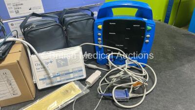 Mixed Lot including 2 x Airtraq Avant A-590 Docking Stations, 1 x Oridion MicroCap Plus Hand-Held Capnograph Pulse Oximeter, 1 x GE ProCare Dinamap Patient Monitor (Unable to Test Due to No Power Supply), 3 x Boxes of Interconnect Tubes, 1 x OxyTip+ Ear S
