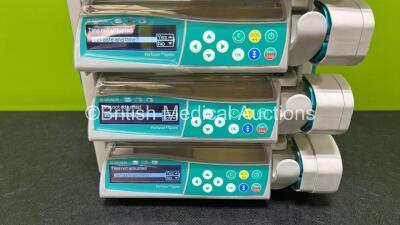 4 x B.Braun Perfusor Space Syringe Pumps with 1 x B.Braun Space Station (All Power Up, 1 x Faulty Screen - See Photos) - 4