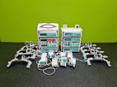 Job Lot Including 8 x B.Braun Infusomat Space Infusion Pumps (5 x Only Power Up), 2 x B.Braun Space Stations (Both Power Up) with 8 x Ref 87131130 Pole Clamps and 8 x Power Supplies (All Untested) *SN 380202 / 506296 / 380221 / 380155 / 380223 / 380086 