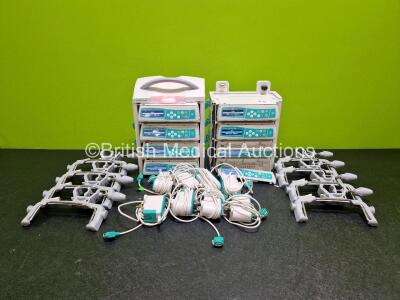 Job Lot Including 8 x B.Braun Infusomat Space Infusion Pumps (All Power Up,1 x with Damaged Front Cover - See Photo) 2 x B.Braun Space Stations (Both Power Up) with 8 x Ref 87131130 Pole Clamps and 8 x Power Supplies (All Untested) *SN 506539 / 506330 /