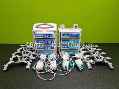 Job Lot Including 8 x B.Braun Infusomat Space Infusion Pumps (7 x Power Up), 2 x B.Braun Space Stations (Both Power Up) with 8 x Ref 87131130 Pole Clamps and 8 x Power Supplies (All Untested) *SN 380124 / 380131 / 380201 / 506344 / 379408 / 379463 / 37