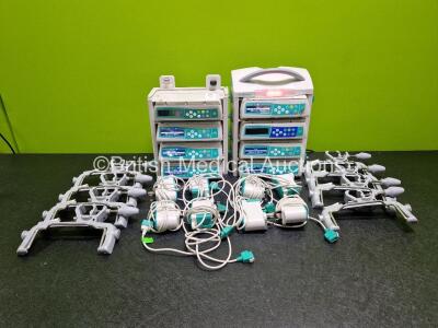 Job Lot Including 8 x B.Braun Infusomat Space Infusion Pumps (All Power Up) 2 x B.Braun Space Stations (Both Power Up) with 8 x Ref 87131130 Pole Clamps and 8 x Power Supplies (All Untested) *SN 380181 / 380168 / 380064 / 379392 / 380203 / 506332 / 3801