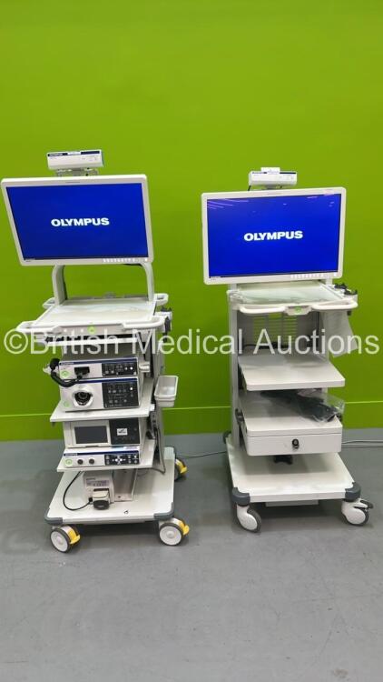 Olympus Stack System Including 2 x Trolleys, 2 x Olympus OEV262H Monitors, Keyboard, Olympus Evis Lucera Elite CV-290, MAJ-1911 Pigtail, Olympus Evis Lucera Elite CLV-290SL, Olympus IMH-20 Image Management Hub, Olympus UPD-3 Scope Guide and Olympus OFP-2