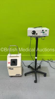 1 x Luxtec 9300XSP Light Source on Stand and 1 x Walker Filtration Laservac 105 Suction Unit (Powers Up) *S/N 092603 / 0488*