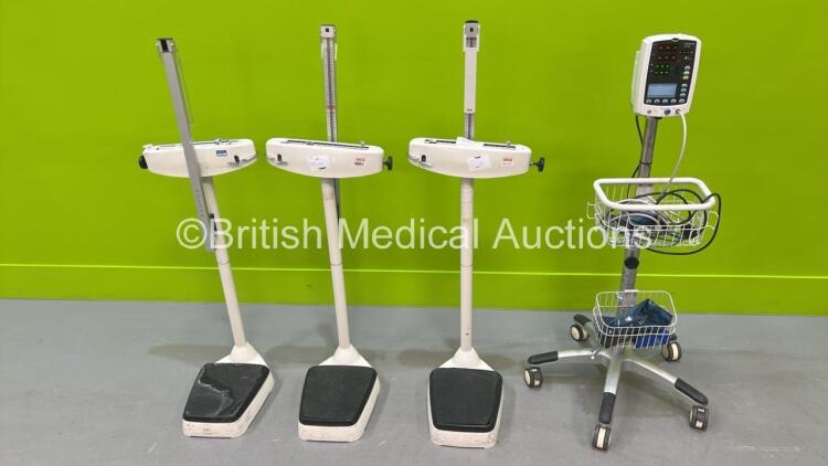 1 x Mindray VS-800 Vital Signs Monitor on Stand (Powers Up - Missing Light Cover) and 2 x Stand on Weighing Scales *S/N BY-36145770*