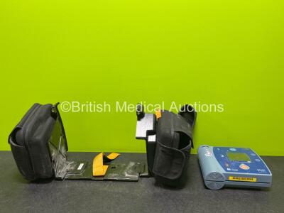 Job Lot Including 1 x Lifepak Defibrillator Carry Case and 1 x Laerdal Heartstart FR2+ Defibrillator (Damaged Casing - See Photos)