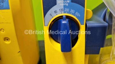 3 x Laerdal LSU Suction Units Including 3 x NiMH Batteries and 3 x Suction Cups and Lids (All Power Up, All Damaged Casings and 1 x Faulty Dial - See Photos) - 6