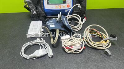 Zoll X Series Monitor/Defibrillator Application Version 02.34.05.00 (Powers Up and Passes Self Test) Including ECG, SPO2, NIBP, CO2 and Printer Options with 4 and 6 Lead ECG Lead, SPO2 Finger Sensor, NIBP Cuff and Hose, 2 x Sure Power II Li-Ion Batteries - 4