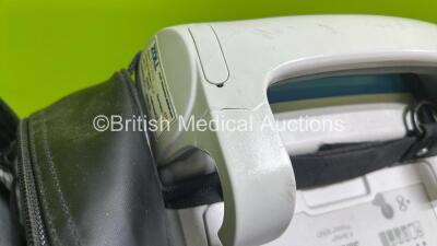 Zoll X Series Monitor/Defibrillator Application Version 02.34.05.00 (Powers Up and Passes Self Test, Cracked Handle - See Photo) Including Pacer, ECG, SPO2, NIBP, CO2 and Printer Options with 2 x Sure Power II Li-Ion Batteries and 1 x Paddle Lead *SN AR16 - 8