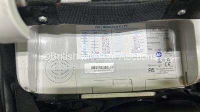 Zoll X Series Monitor/Defibrillator Application Version 02.34.05.00 (Powers Up and Passes Self Test, Cracked Handle - See Photo) Including Pacer, ECG, SPO2, NIBP, CO2 and Printer Options with 2 x Sure Power II Li-Ion Batteries and 1 x Paddle Lead *SN AR16 - 9