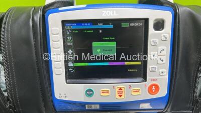 Zoll X Series Monitor/Defibrillator Application Version 02.34.05.00 (Powers Up and Passes Self Test) Including Pacer, ECG, SPO2, NIBP, CO2 and Printer Options with 2 x Sure Power II Li-Ion Batteries, 1 x 6 Lead ECG Lead Adapter and 1 x Paddle Lead *SN AR1 - 2