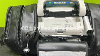 Zoll X Series Monitor/Defibrillator Application Version 02.34.05.00 (Powers Up and Passes Self Test) Including Pacer, ECG, SPO2, NIBP, CO2 and Printer Options with 2 x Sure Power II Li-Ion Batteries, 1 x 6 Lead ECG Lead Adapter and 1 x Paddle Lead *SN AR1 - 7