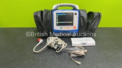 Zoll X Series Monitor/Defibrillator Application Version 02.34.05.00 (Powers Up and Passes Self Test, Printer Missing Metal Plate) Including Pacer ECG, SPO2, NIBP, CO2 and Printer Options with 2 x Sure Power II Li-Ion Batteries, 1 x 6 Lead ECG Lead Adapter