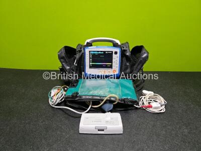 Zoll X Series Monitor/Defibrillator Application Version 02.34.05.00 (Powers Up and Passes Self Test) in Case Including ECG, SPO2, NIBP, CO2 and Printer Options with 2 x Sure Power II Li-Ion Batteries ,1 x Ref 8300-0803-12 4 Lead ECG Lead and 1 x SpO2 Cabl