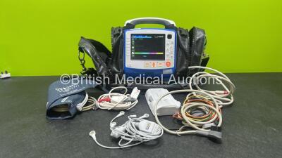 Zoll X Series Monitor/Defibrillator Application Version 02.34.05.00 (Powers Up and Passes Self Test) Including ECG, SPO2, NIBP, CO2 and Printer Options with 4 and 6 Lead ECG Lead, SPO2 Finger Sensor, NIBP Cuff and Hose, 2 x Sure Power II Li-Ion Batteries 