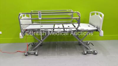 1 x MMO 5000 Electric Hospital Bed with Controller (Powers Up - Missing Upper Bed Section - See Pictures) *S/N MED009490* **Stock Photo Used**