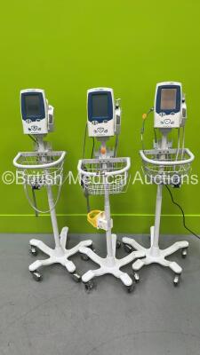 3 x Welch Allyn SPOT Vital Signs LXi Patient Monitors on Stands (All Power Up) *20120201190 / 20140301775 / 0120301679*