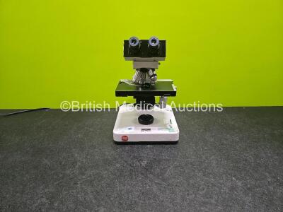 Leitz 020-452.003 Microscope with 2 x Periplan 12.5x Eyepieces (No Power) 4 x Optics Including 1 x NPL FLUOTAR 40/0.70, 1 x NPL FLUOTAR 100/1.32, 1 x NPL FLUOTAR 25/0.55 and 1 x Olympus D PLAN 10 0.25