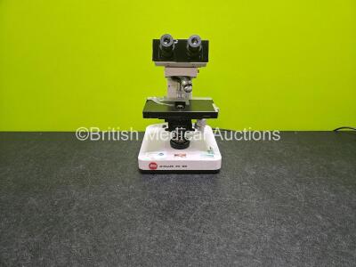 Leitz Dialux 22EB Benchtop Microscope (Powers Up) with 2x 10 x Eyepieces and 2 x Optics Including 1 x NPL FLUOTAR 25/0.55 and 1 x Olympus D PLAN 10/0.25