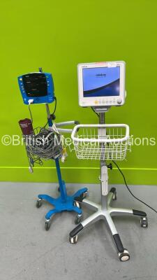 1 x Mindray iPM 10 Patient Monitor on Stand with T1, T2, SPO2, ECG and NIBP Options and 1 x GE Dinamap V100 Monitor on Stand (Both Power Up) *SDT08450072SP*