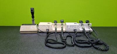 Job Lot Including 2 x Welch Allyn 767 Series Wall Mounted Transformers (Both Power Up and 1 x Damaged Cable - See Photos) with 4 x Handles and 4 x Attachments and 1 x Welch Allyn Retinoscope (No Power - Suspected Flat Battery) with Docking Station (Powers