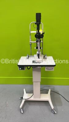 TopCon SL-3E Slit Lamp with Binoculars, 2 x 10x Eyepieces and Chin Rest (Some Damage - See Photo) on Motorized Table (Powers Up with Good Bulb) *S/N 633423*