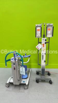 1 x Arjo Encore Patient Hoist with Controller and Battery (No Movement - Possible Flat Battery) and 1 x Smiths Level 1 System 1000 Fluid Warmer (Powers Up) *GL*