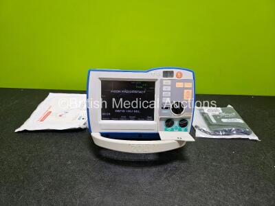 Zoll R Series Plus Defibrillator / Monitor (Powers Up) Including Pacer, ECG and Printer Options with 1 x BP Cuff, 1 x Electrode Pack, 1 x Paddle Lead and 1 x Li-ion Battery