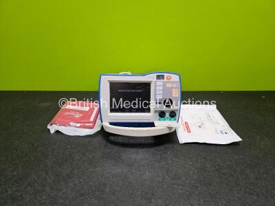 Zoll R Series Plus Defibrillator / Monitor (Powers Up) Including Pacer, ECG and Printer Options with 1 x BP Cuff, 1 x Electrode Pack, 1 x Paddle Lead and 1 x Li-ion Battery