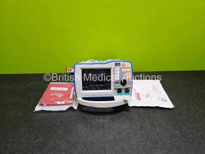 Zoll R Series Plus Defibrillator / Monitor (Powers Up) Including Pacer, ECG and Printer Options with 1 x BP Cuff, 1 x Electrode Pack, 1 x Paddle Lead and 1 x Li-ion Battery