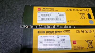 2 x Medtronic Lifepak 1000 Defibrillators *Mfd - 2018 / 2014* (Both Power Up) in Case with 2 x 3 Lead ECG Leads and 2 x Li/MnO2 Batteries *Install Before - 2024 / 2024* - 5