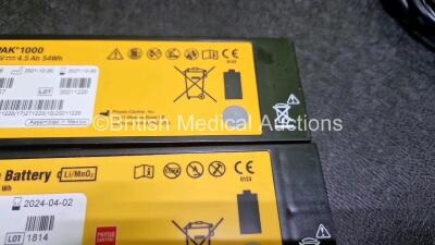 2 x Medtronic Lifepak 1000 Defibrillators *Mfd - 2018 / 2014* (Both Power Up) in Case with 2 x 3 Lead ECG Leads and 2 x Li/MnO2 Batteries *Install Before - 2024 / 2024* - 6