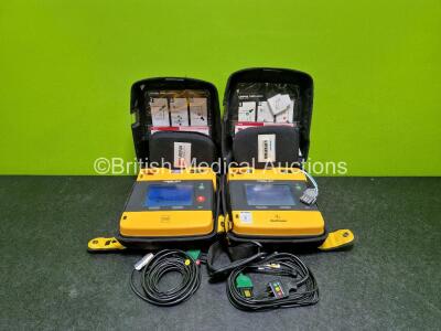 2 x Medtronic Lifepak 1000 Defibrillators *Mfd - 2016 / 2007* (Both Power Up) in Case with 2 x 3 Lead ECG Leads and 2 x Li/MnO2 Batteries *Install Before - 2027 / 2023*