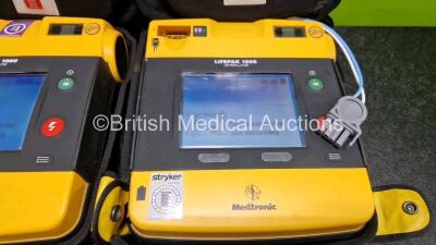 2 x Medtronic Lifepak 1000 Defibrillators *Mfd - 2016 / 2007* (Both Power Up) in Case with 2 x 3 Lead ECG Leads and 2 x Li/MnO2 Batteries *Install Before - 2027 / 2023* - 3