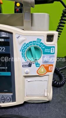 Philips Heartstart MRx Defibrillator (Powers Up, Crack in Handle - See Photo) Including Pacer, ECG and Printer Options with External Hard Paddles, 1 x Philips M3539A Module, 1 x Philips M3538A Li-Ion Battery, 1 x Paddle Lead and 1 x M3725A Test Load - 3