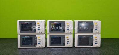 6 x Philips IntelliVue X2 Handheld Patient Monitors (All Power Up and 1 x Damaged Case - See Photos) Including ECG, SpO2, NBP, Press and Temp Options and 6 x Philips M4607A Rechargeable Lithium Ion Batteries *SN DE83632520 / DE03791517 / DE466H4994 / DE03