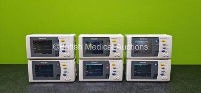 6 x Philips IntelliVue X2 Handheld Patient Monitors (All Power Up and 2 x Cracked Cases - See Photos) Including ECG, SpO2, NBP, Press and Temp Options and 6 x Philips M4607A Rechargeable Lithium Ion Batteries *SN DE315E6266 / DE535L6308 / DE654U2979 / DE6