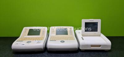 Job Lot Including 2 x Philips PageWriter Trim II ECG Machines (Both Power Up and Both Damaged Cases - See Photos) and 1 x Philips FM30 Fetal Monitor (Missing Power Supply Connector - See Photos)