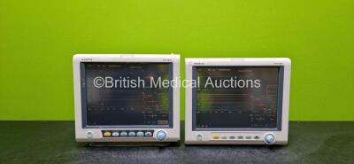 2 x Mindray iPM-9800 Patient Monitors Including SpO2, T1, T2, NIBP, ECG, IBP1, IBP2, CO2 and Printer Options and 4 x Lithium Batteries (Both Power Up, Both Missing Handles and Both Damaged Cases - See Photos)