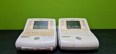 2 x Philips PageWriter Trim II ECG Machines (Both Power Up, 1 x Faulty Screen and 1 x Damaged Case - See Photos)