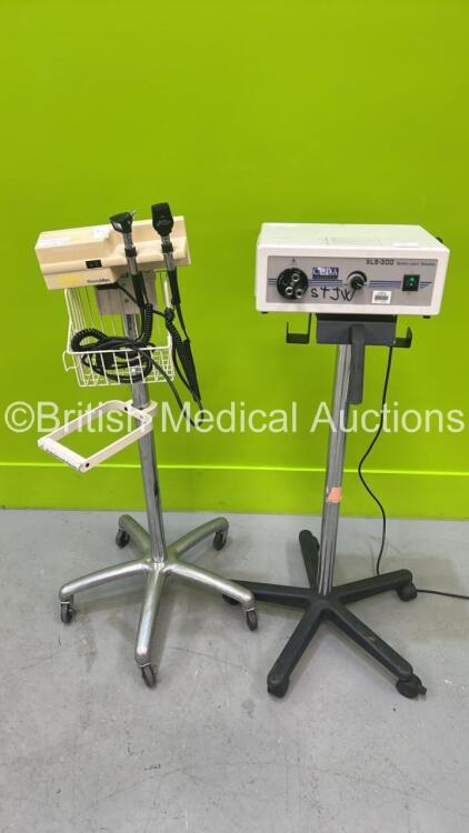 1 x Cuda XLS-300 Xenon Light Source on Stand (Powers Up) and 1 x Welch Allyn 767 Transformer with 2 x Attachments on Stand (No Power) *300-00196*