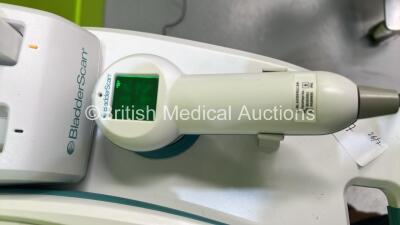 Verathon BVI 9400 Bladder Scanner Part No 0570-0190 with Transducer, 2 x Batteries and Charger on Table (Powers Up) *S/N B4307585* - 2